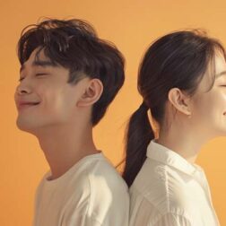 Adult Asian people both wear white clothes The side faces are in the same direction